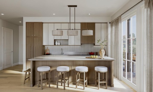 kitchen with ample counter-space, modern appliances and bright lighting