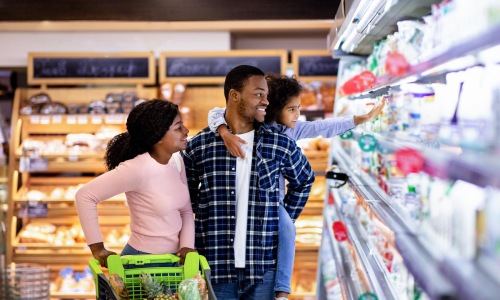 people shopping in a grocery store